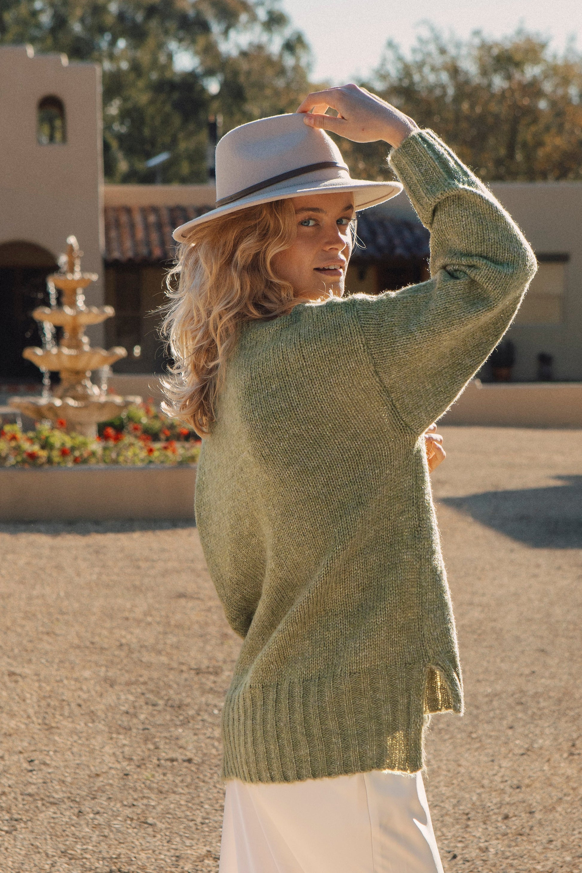 Vera Knit - moss green sweater. Side view.