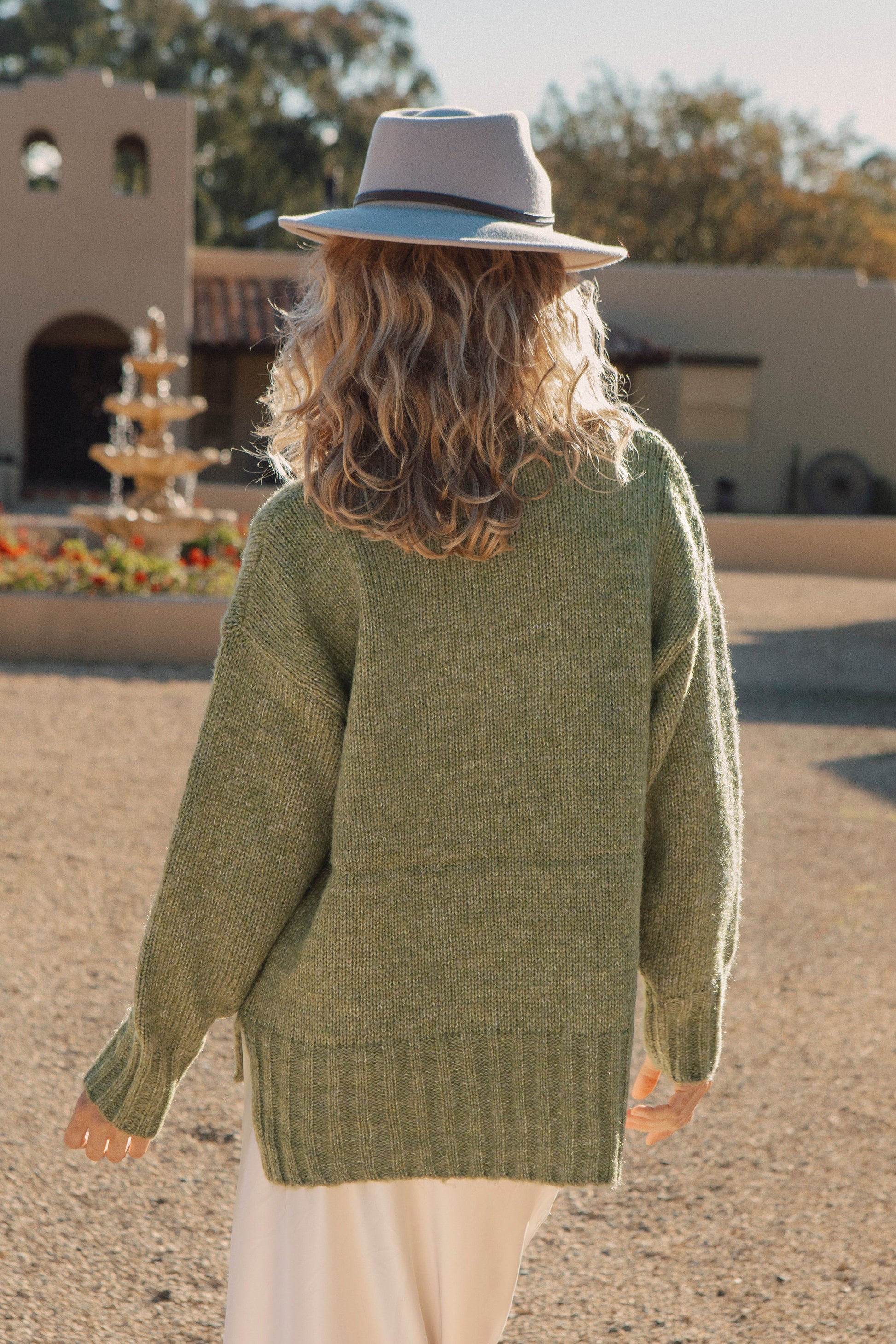 Vera Knit - moss green sweater. Rear view.