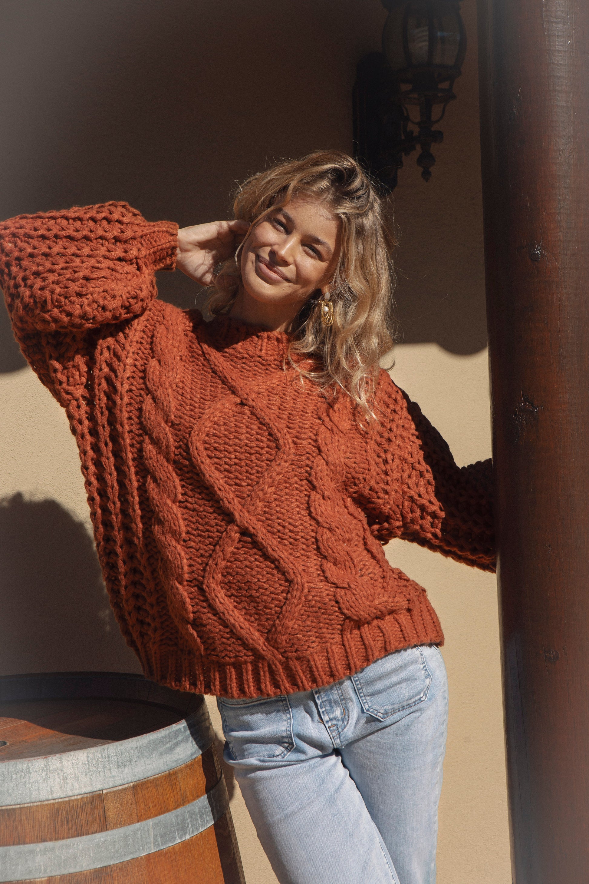 Wildwood Knit Ember features chunky cable knit and beautiful rust colour