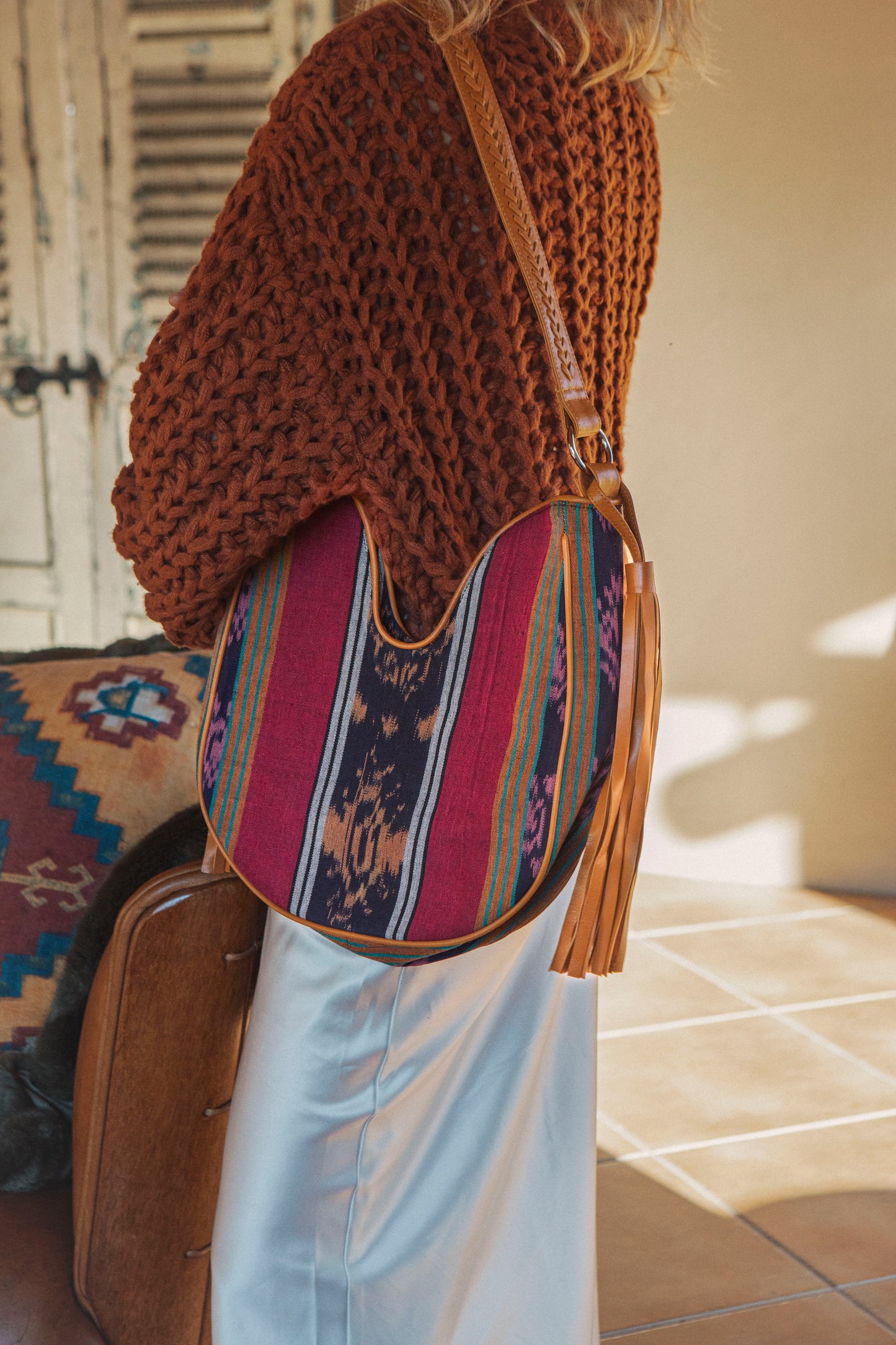 Hobo style u shape shoulder bag featuring rainbow Ikat pattern - Zanzibar Tassel Bag