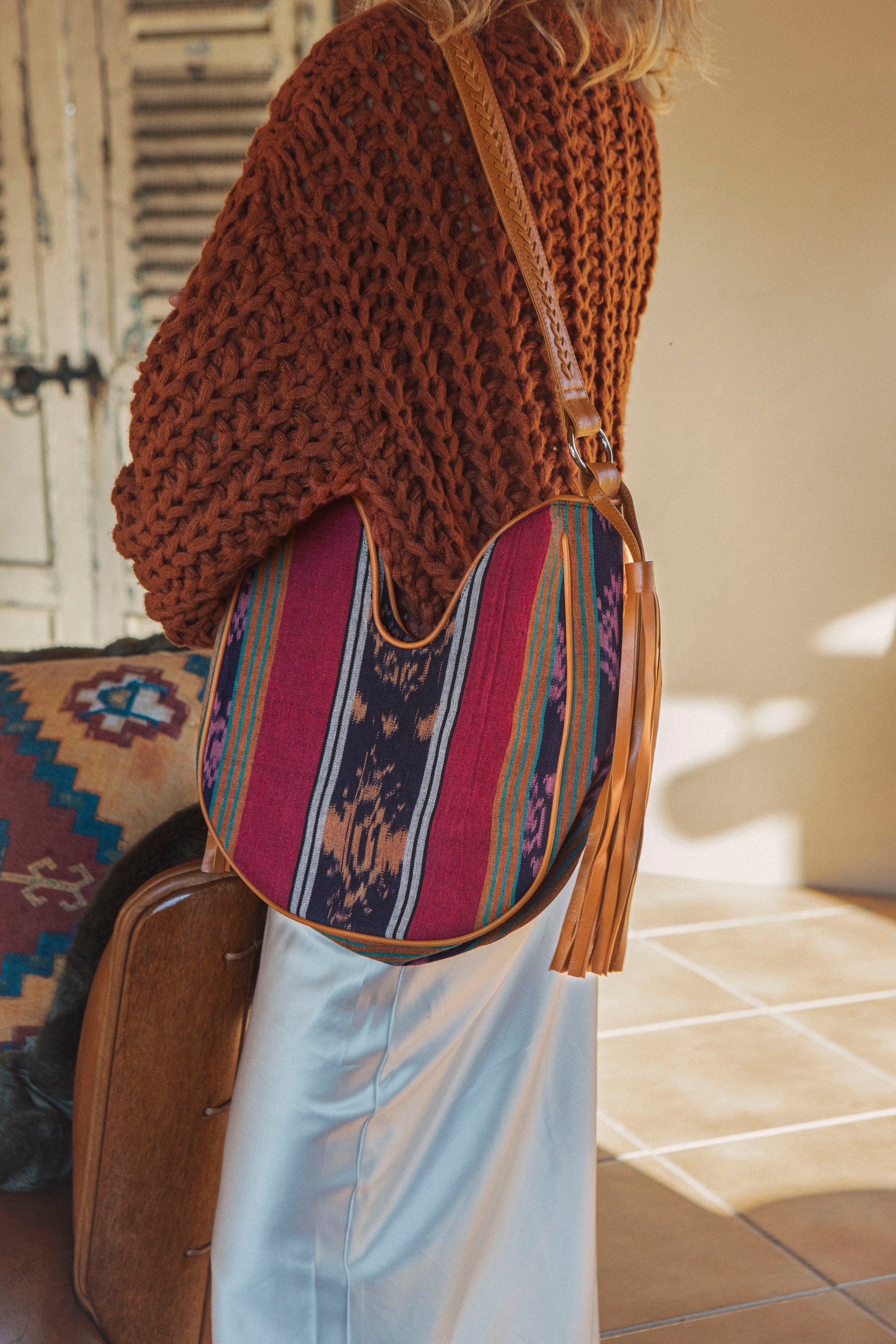 Hobo style u shape shoulder bag featuring rainbow Ikat pattern - Zanzibar Tassel Bag